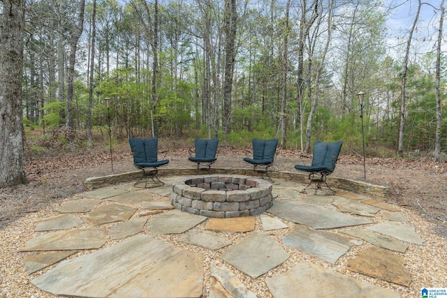 view of patio / terrace with a fire pit