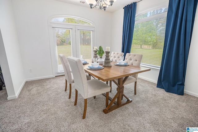 16 Eagle Rock Dr, Alabaster, AL 35007 - carpeted dining space featuring a wealth of natural light, a chandelier, and baseboards