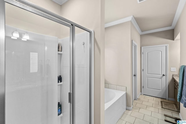 full bath featuring crown molding, a garden tub, a shower stall, tile patterned flooring, and baseboards