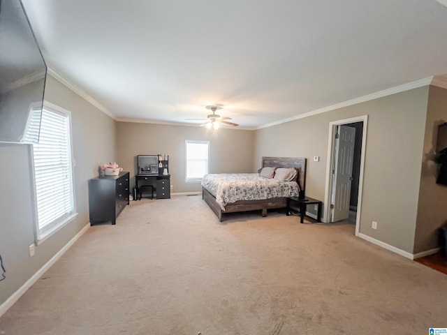 bedroom featuring crown molding, baseboards, ceiling fan, and light carpet