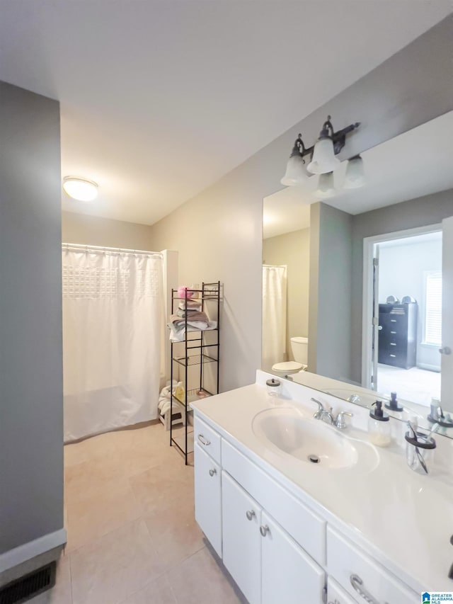 full bath featuring vanity, visible vents, and toilet
