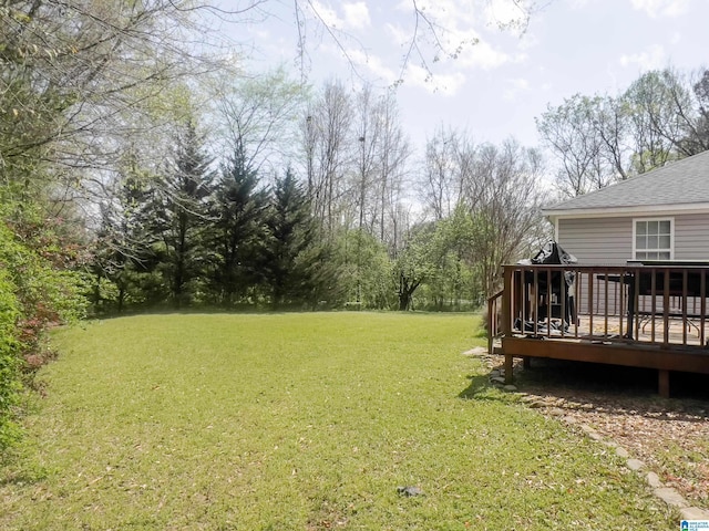 view of yard featuring a deck