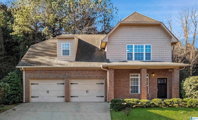 view of front of home with roof with shingles, brick siding, driveway, and an attached garage