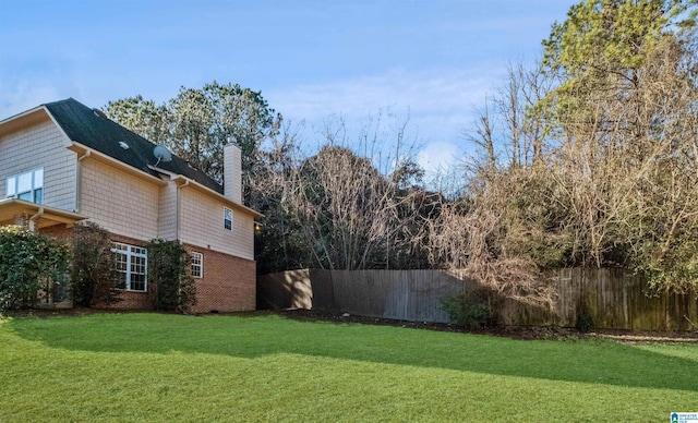 view of yard with fence