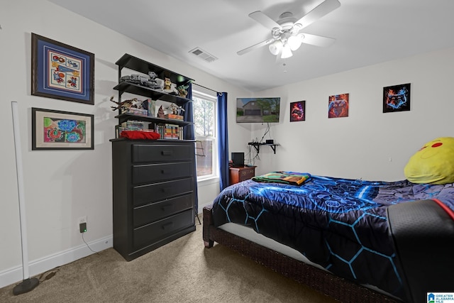 bedroom featuring carpet floors, visible vents, baseboards, and ceiling fan
