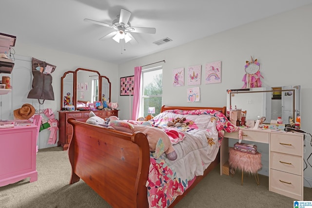 bedroom featuring carpet floors, visible vents, and a ceiling fan