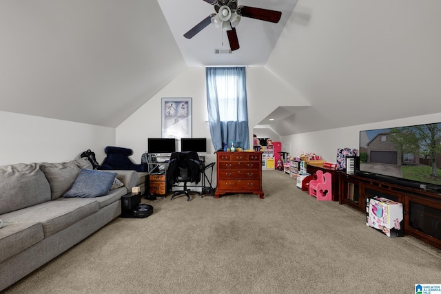 interior space featuring lofted ceiling, visible vents, carpet flooring, and ceiling fan