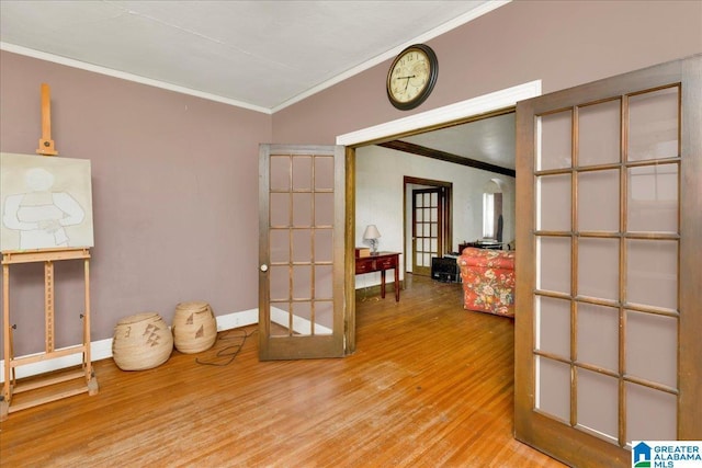 2701 21st St, Birmingham, AL 35208 - miscellaneous room with ornamental molding, baseboards, and wood finished floors