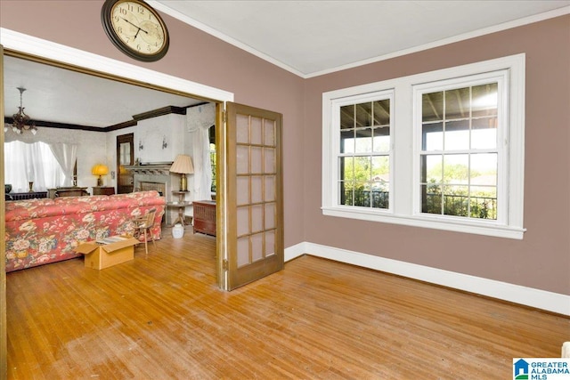 2701 21st St, Birmingham, AL 35208 - interior space featuring crown molding, baseboards, and wood finished floors