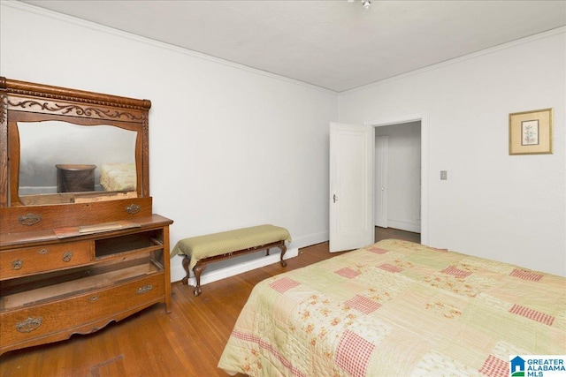2701 21st St, Birmingham, AL 35208 - bedroom featuring crown molding and wood finished floors