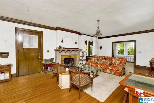 2701 21st St, Birmingham, AL 35208 - living area featuring plenty of natural light, an inviting chandelier, and wood finished floors