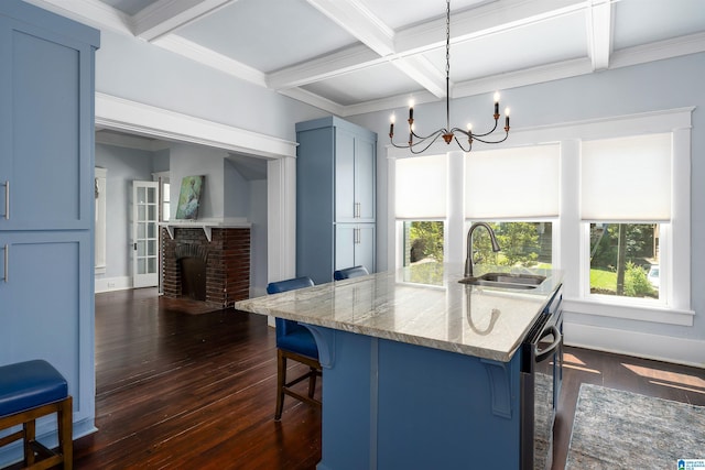 1730 Cullom St S, Birmingham, AL 35205 - kitchen featuring a sink, a breakfast bar, dark wood-style floors, light stone countertops, and coffered ceiling