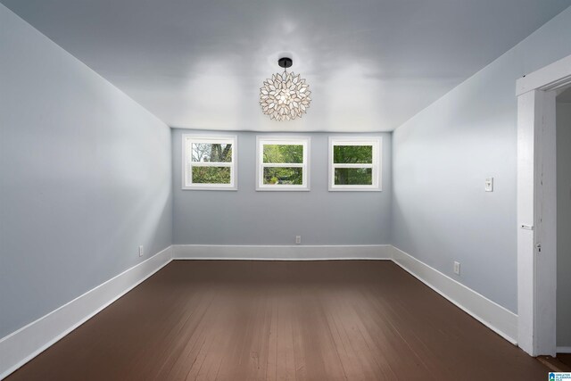 1730 Cullom St S, Birmingham, AL 35205 - spare room featuring baseboards and dark wood finished floors
