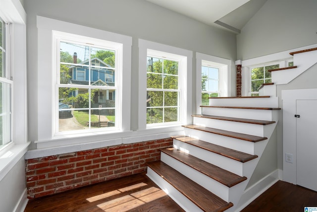 1730 Cullom St S, Birmingham, AL 35205 - staircase featuring brick wall, plenty of natural light, and wood finished floors