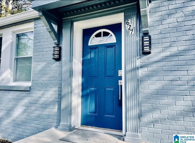 627 Sidney Cir, Anniston, AL 36207 - doorway to property featuring brick siding