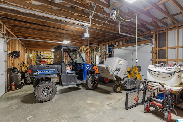 garage featuring a garage door opener