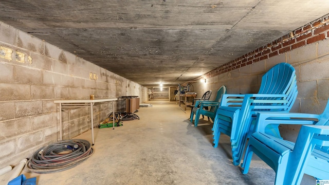 interior space featuring concrete block wall