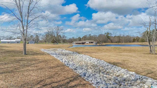 view of yard with a water view