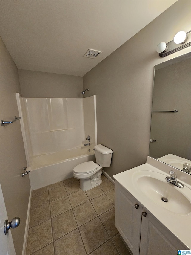 bathroom featuring vanity, tile patterned flooring, toilet, visible vents, and shower / bathing tub combination