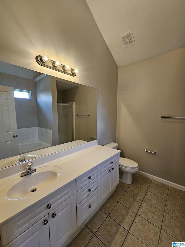 bathroom featuring visible vents, a bath, baseboards, a shower stall, and tile patterned flooring