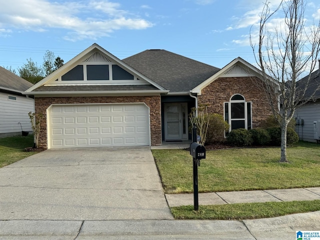 view of front of house with stone siding, a front lawn, an attached garage, a shingled roof, and driveway