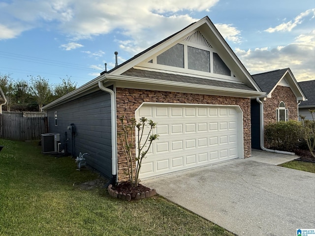 view of property exterior featuring central AC, a yard, stone siding, fence, and driveway