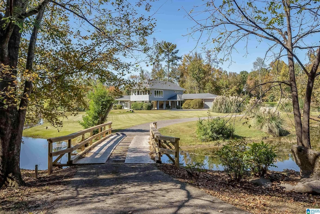 280 Rockford Rd, Indian Springs Village, AL 35124 - surrounding community with a water view, a lawn, and driveway