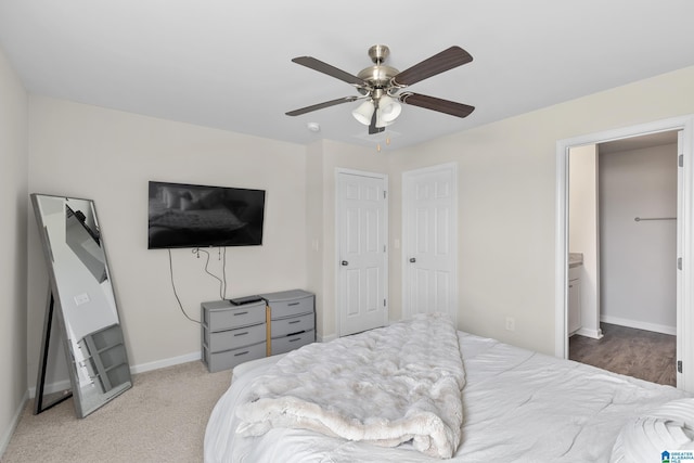 bedroom featuring a ceiling fan and baseboards