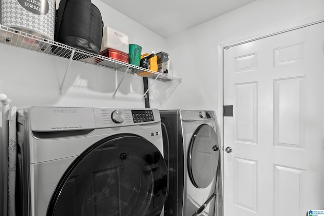 laundry area featuring washing machine and dryer and laundry area