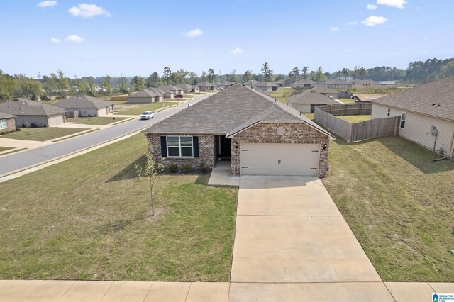 ranch-style house featuring a residential view, driveway, fence, brick siding, and an attached garage