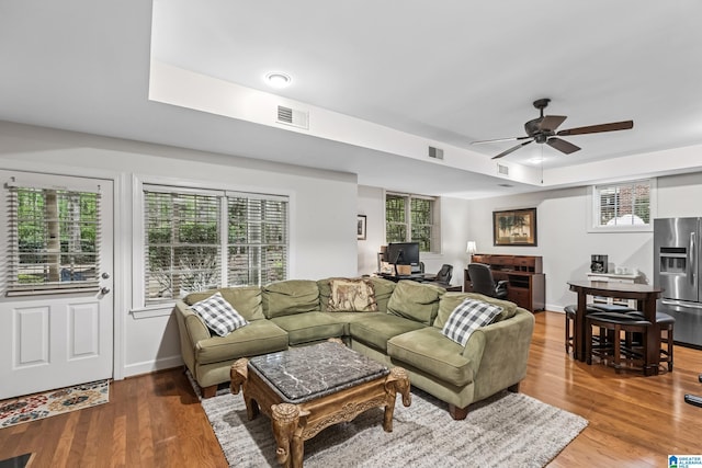 5006 Aberdeen Way, Hoover, AL 35242 - living area featuring ceiling fan, visible vents, a tray ceiling, and wood finished floors