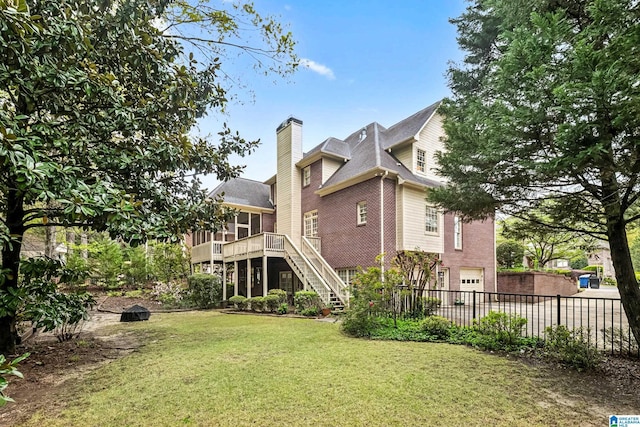 5006 Aberdeen Way, Hoover, AL 35242 - back of property featuring a chimney, stairway, a garage, a yard, and fence