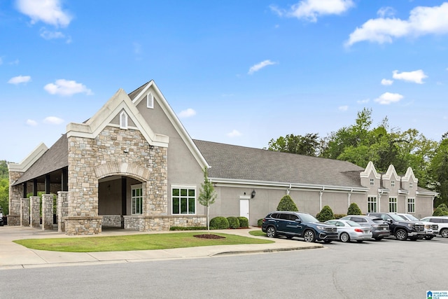 5006 Aberdeen Way, Hoover, AL 35242 - view of front of property featuring stone siding, uncovered parking, and stucco siding