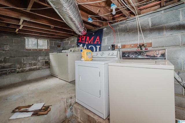 laundry room with independent washer and dryer and laundry area