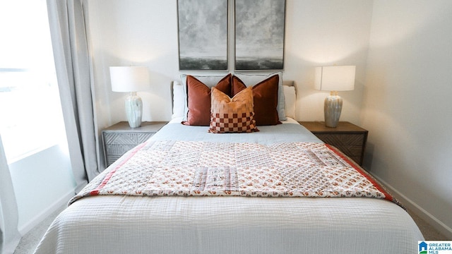 bedroom featuring baseboards