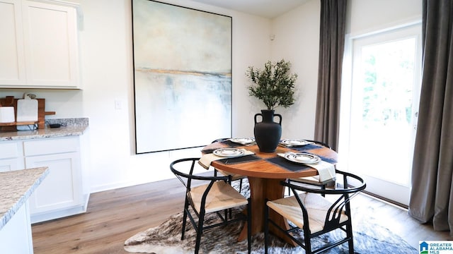 dining room featuring light wood finished floors