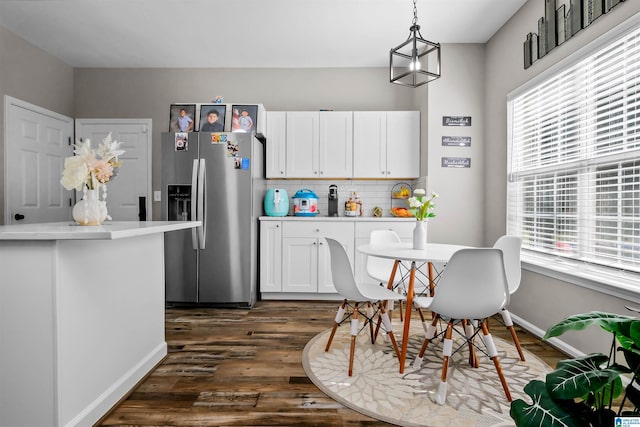 5544 Colony Ln, Hoover, AL 35226 - kitchen with tasteful backsplash, white cabinets, stainless steel fridge, light countertops, and dark wood-style floors