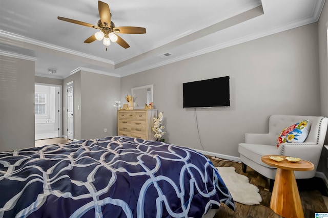 5544 Colony Ln, Hoover, AL 35226 - bedroom featuring baseboards, crown molding, visible vents, a raised ceiling, and wood finished floors