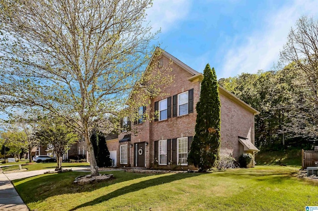 5544 Colony Ln, Hoover, AL 35226 - view of front of house featuring brick siding and a front lawn