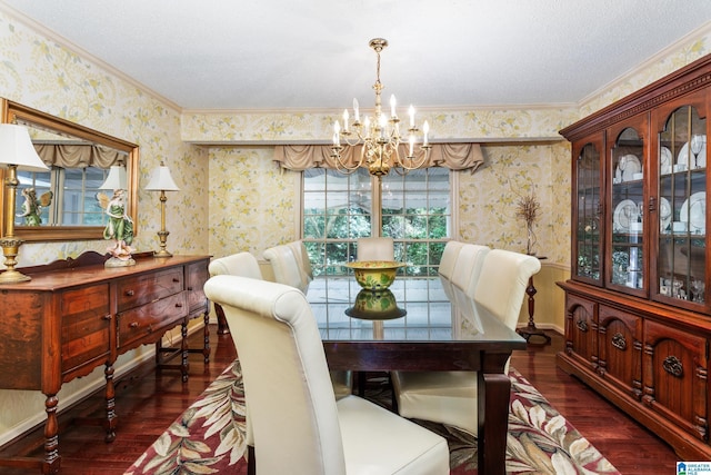 dining room featuring crown molding, a chandelier, wood finished floors, and wallpapered walls