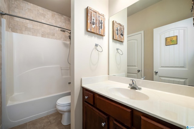 full bathroom with tile patterned flooring, toilet, shower / bathtub combination, and vanity