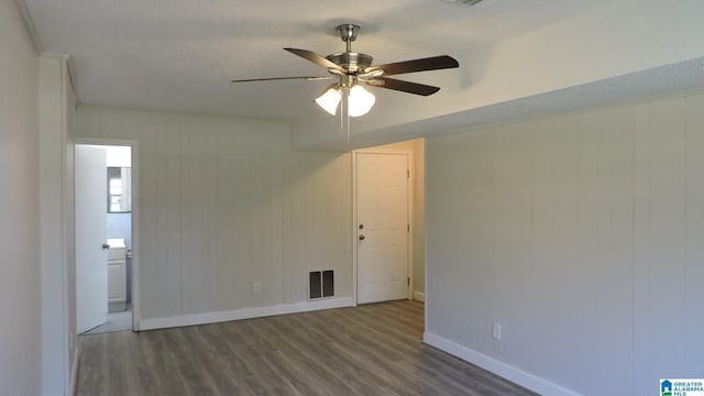 987 Chichester Dr, Birmingham, AL 35214 - empty room with wood finished floors, ceiling fan, baseboards, and visible vents