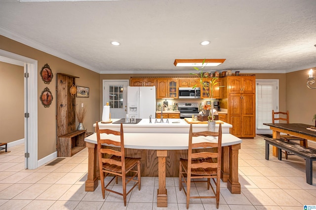 dining space with crown molding, light tile patterned floors, and recessed lighting