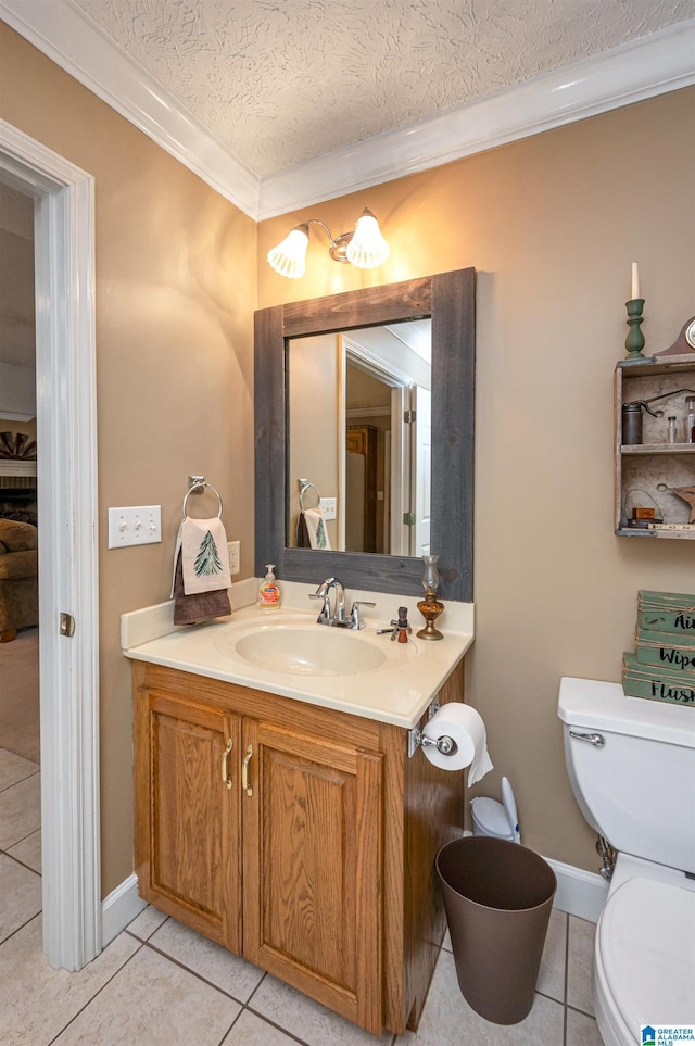 half bathroom with ornamental molding, toilet, a textured ceiling, vanity, and tile patterned flooring
