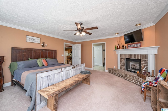 bedroom featuring crown molding, a fireplace, a textured ceiling, carpet floors, and baseboards