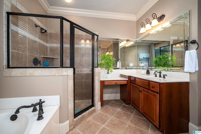 bathroom with crown molding, a shower stall, vanity, tile patterned floors, and a garden tub