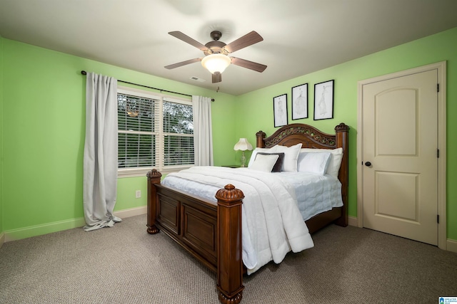 bedroom featuring carpet, visible vents, baseboards, and ceiling fan