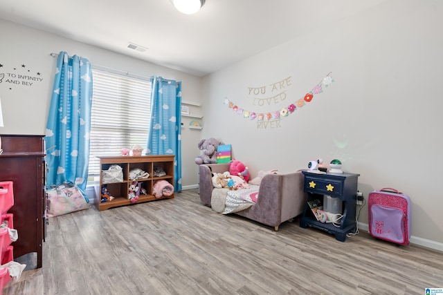 6106 Townley Ct, Mccalla, AL 35111 - game room featuring visible vents, baseboards, and wood finished floors