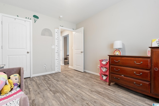 6106 Townley Ct, Mccalla, AL 35111 - bedroom with light wood-style flooring and baseboards