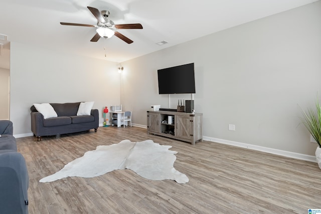 6106 Townley Ct, Mccalla, AL 35111 - living room with visible vents, baseboards, a ceiling fan, and wood finished floors